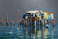 Colourful stilt house on wooden poles over turquoise water with seagulls and a grey sky